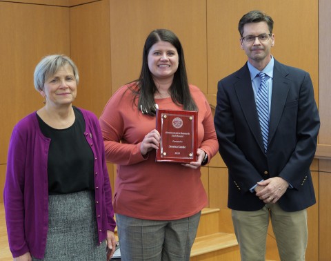 Jessica Costic receiving award