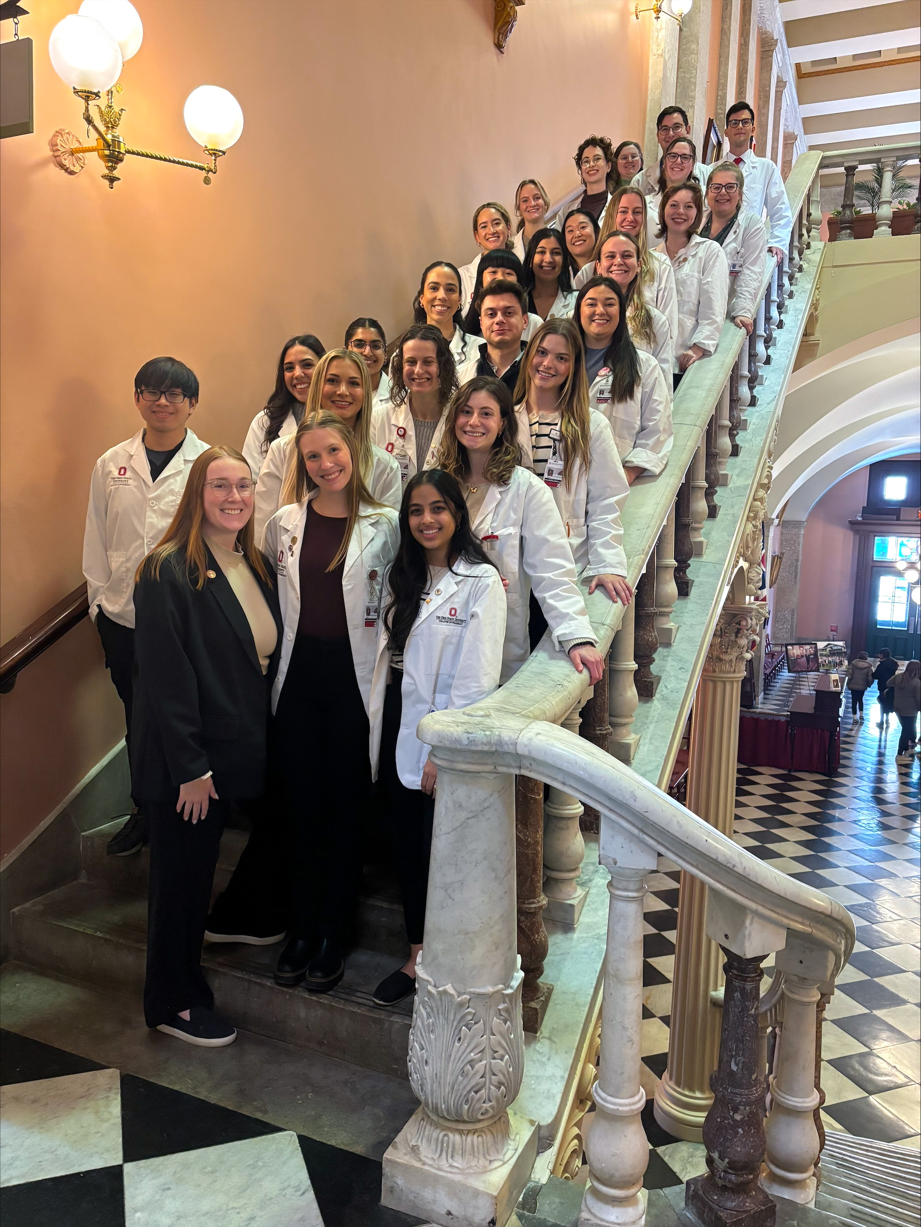 Advocacy Fellow Bella Blankenship, PharmD, with Ohio State PharmD candidates at the Ohio Statehouse